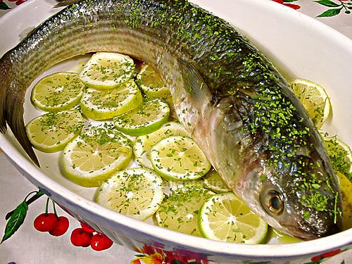 Baked grey mullet
