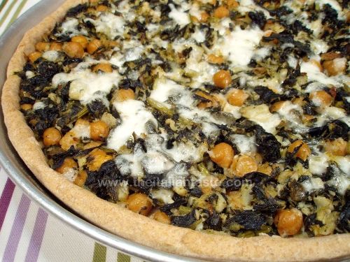 Savory tart with salt cod, chickpeas, kale