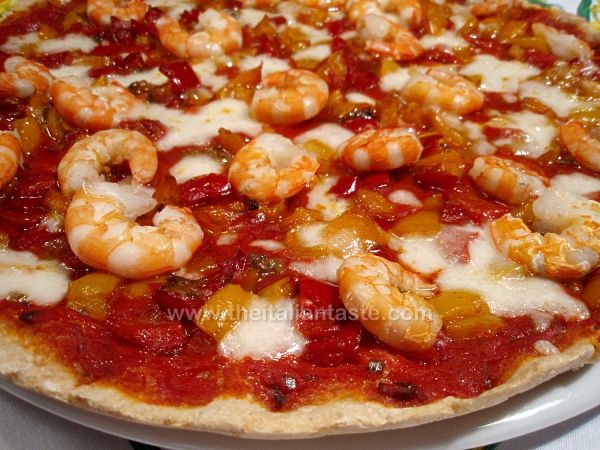 Pizza with prawn tails and peppers