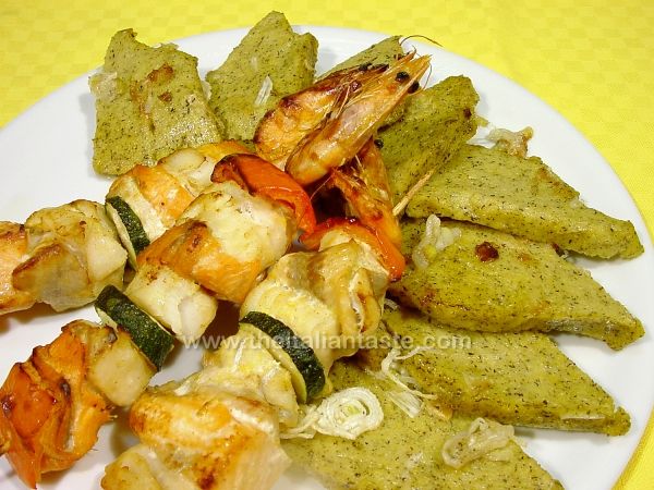 Polenta with fish skewers