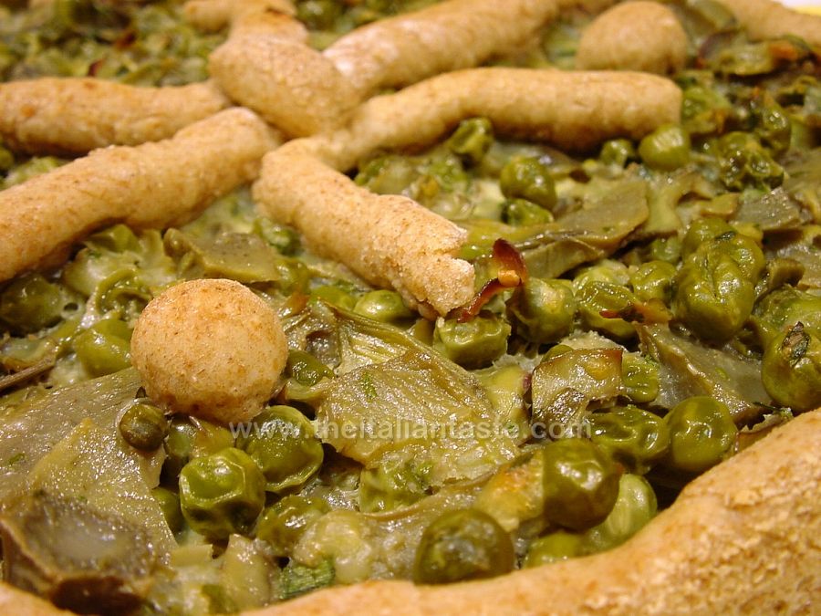 Savory tart filled with artchokes, peas and asparagus
